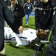 France's defender Djibril Sidibe is stretched away from the pitch following an injury during the FIFA World Cup 2018 qualifying football match Luxembourg vs France on March 25, 2017 at Josy Bartel stadium in Luxembourg