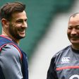 England's coach Eddie Jones (R) and scrum-half Danny Care attend a training session at Twickenham stadium in London, on March 10, 2017