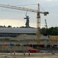 Construction site of the Arena Pobeda (Victory Stadium) football stadium in Volgograd, with the statue of Mother Homeland seen in the background