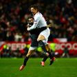 Sevilla's forward Stevan Jovetic (R) celebrates with Sevilla's forward Wissam Ben Yedder after scoring the 2-1 victory goal during the Spanish league football match Sevilla FC vs Real Madrid CF on January 15, 2017