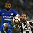 Udinese defender and captain Danilo Larangeira (L) challenges Juventus forward Gonzalo Higuain for the ball during the Italian Serie A match at the 'Juventus Stadium' in Turin on October 15, 2016