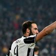 Juventus' forward Gonzalo Higuain celebrates after scoring a goal in Turin on October 29, 2016