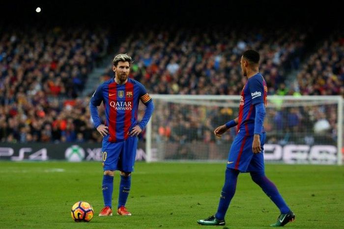 Barcelona's Argentinian forward Lionel Messi (L) may clash with team mate Brazilian forward Neymar at a "Superclassico" gala match in Australia next year