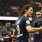 Paris Saint-Germain's Edinson Cavani (L) is congratulated by teammates after scoring a goal during their French L1 football match against Montpellier at the Parc des Princes stadium in Paris on April 22, 2017