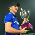 England captain Jos Buttler poses with the series trophy after his side's victory in the third ODI against Bangladesh at The Zahur Ahmed Chowdhury Stadium in Chittagong on October 12, 2016