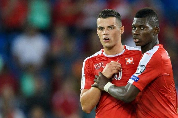 Swiss midfielder Granit Xhaka (left) has been sent off eight times for club and country since April 2014