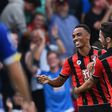 Junior Stanislas (left) scored a double as Bournemouth beat Hull 6-1