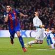 Barcelona's forward Luis Suarez (L) celebrates his goal on December 18, 2016