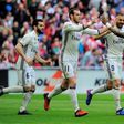 Real Madrid's players celebrate after forward Karim Benzema (2R) scored their team's first goal during the Spanish league football match against Athletic Club Bilbao 18, 2017