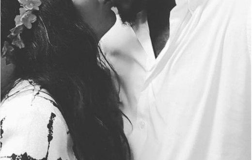 Annie Idibia and 2Face Idibia share a kiss.