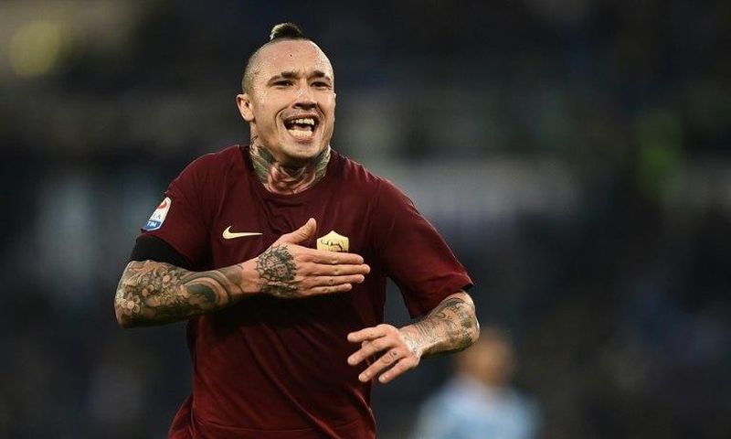 Roma's Radja Nainggolan celebrates after scoring during the Serie A match against Lazio at the Olympic Stadium in Rome, on December 4, 2016