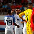 Chris Wondolowski (No. 18) of the US celebrates with teammate Julian Green after he assisted Green's goal against Cuba, at Estadio Pedro Marrero in Havana, on October 7, 2016