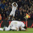Real Madrid's forward Cristiano Ronaldo celebrates after scoring a goal against in Barcelona on April 2, 2016