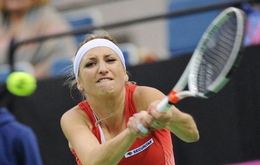 Switzerland's Timea Bacsinszky returns the ball to Belarus' Aryna Sabalenka during the semi-finals of the Fed Cup tennis competition between Belarus and Switzerland in Minsk on April 22, 2017
