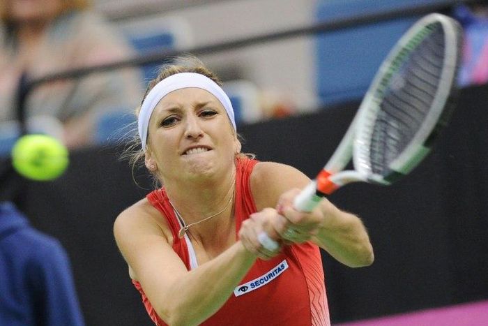 Switzerland's Timea Bacsinszky returns the ball to Belarus' Aryna Sabalenka during the semi-finals of the Fed Cup tennis competition between Belarus and Switzerland in Minsk on April 22, 2017