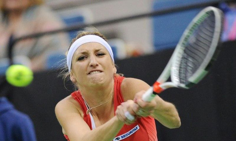Switzerland's Timea Bacsinszky returns the ball to Belarus' Aryna Sabalenka during the semi-finals of the Fed Cup tennis competition between Belarus and Switzerland in Minsk on April 22, 2017