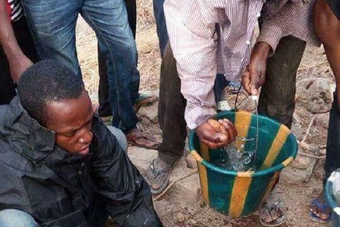 The lucky baby being cleaned up