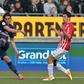 Edinson Cavani (left) scored again as Paris Saint-Germain beat Ligue 1 strugglers Nancy 2-1