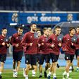 Sevilla's players run during a training session at the Maksimir stadium in Zagreb, on October 17, 2016