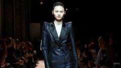 A model wearing one of Mugler's fearsome power suits