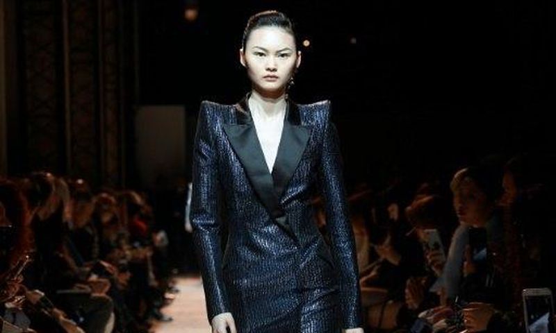A model wearing one of Mugler's fearsome power suits