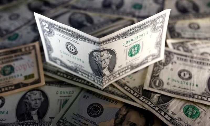 U.S. dollar notes are seen in this November 7, 2016 picture illustration. REUTERS/Dado Ruvic/Illustration/File Photo