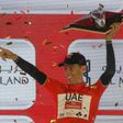 Portugal's Rui Costa, wearing the overall leader red jersey, celebrates on stage after winning the final Yas Island stage of the Tour of Abu Dhabi, on February 26, 2017