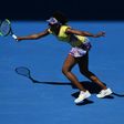 Venus Williams of the US hits a return against Switzerland's Stefanie Voegele during their Australian Open second round match, in Melbourne, on January 18, 2017