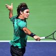 Roger Federer of Switzerland hits a backhand return to Jack Sock of the US in their men's semifinal ATP Indian Wells Masters in Indian Wells, California on March 18, 2017