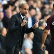 Manchester City's manager Pep Guardiola (L) gestures to Manchester City's Argentinian striker Sergio Aguero during the English Premier League football match between Tottenham Hotspur and Manchester City