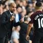 Manchester City's manager Pep Guardiola (L) gestures to Manchester City's Argentinian striker Sergio Aguero during the English Premier League football match between Tottenham Hotspur and Manchester City
