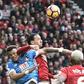 Manchester United's Zlatan Ibrahimovic (C) elbows Bournemouth's Tyrone Mings during the English Premier League football match at Old Trafford, north west England, on March 4, 2017