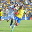 Zamalek's Basem Abdall (L) goes head to hand with Mamelodi Sundowns' Wayne Arendse in the CAF Championship final in Pretoria on October 15, 2016