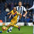 Crystal Palace's Andros Townsend runs with the ball during their English Premier League football match against West Bromwich Albion in West Bromwich, central England, on March 4, 2017 Crystal Palace won the game 2-0.