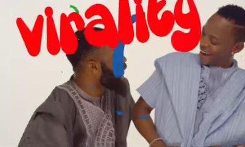 Koffi Tha Guru and Woli Arole.