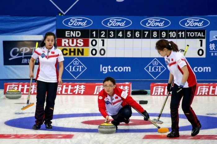 Wang Bingyu (C) has captained China's curling team at historic moments such as a triumph as the 2009 World Championships