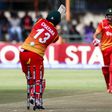Zimbabwe's batsman Tendai Chatara (L) looses his wicket during the second cricket match between India and hosts Zimbabwe in a series of 3 ODI games at Harare Sports Club, on June 13, 2016