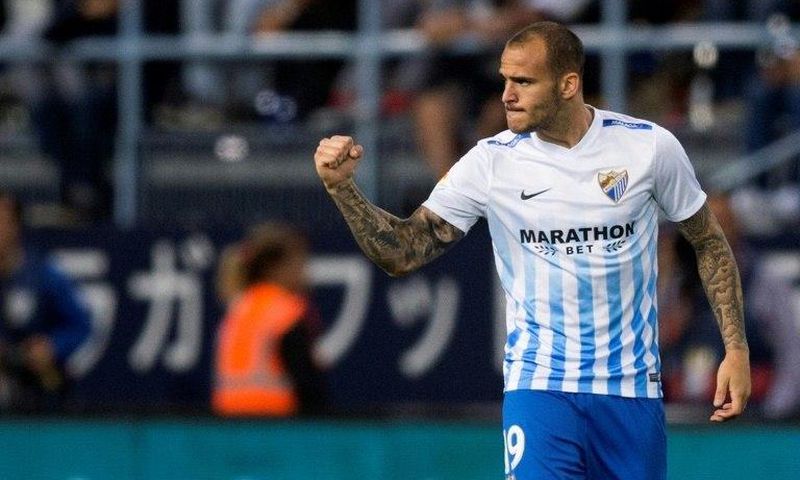 Malaga's forward Sandro Ramirez celebrates after scoring during the Spanish league football match Malaga CF vs Sevilla FC at La Rosaleda stadium in Malaga on May 1, 2017
