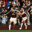 Burnley's midfielder Scott Arfield (L) celebrates scoring their second goal during the English Premier League football match between Burnley and Everton at Turf Moor in Burnley, north west England on October 22, 2016