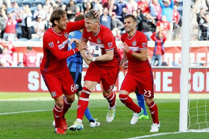 Bastian Schweinsteiger (C) of Chicago Fire celebrates after scoring a goal in the first half during their MLS match against the Montreal Impact, at Toyota Park in Bridgeview, Illinois, on April 1, 2017