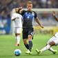 Keisuke Honda (L)blames his own shortcomings for a debate about his future in Japan's national squad