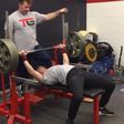 132-Pound Woman Bench Presses.