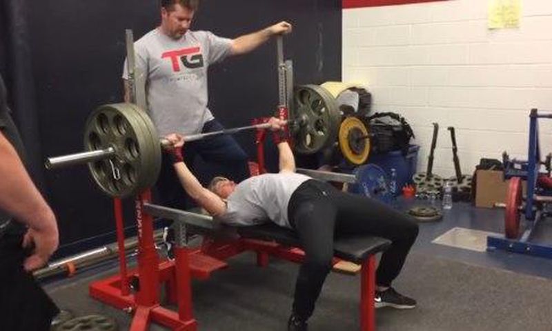 132-Pound Woman Bench Presses.