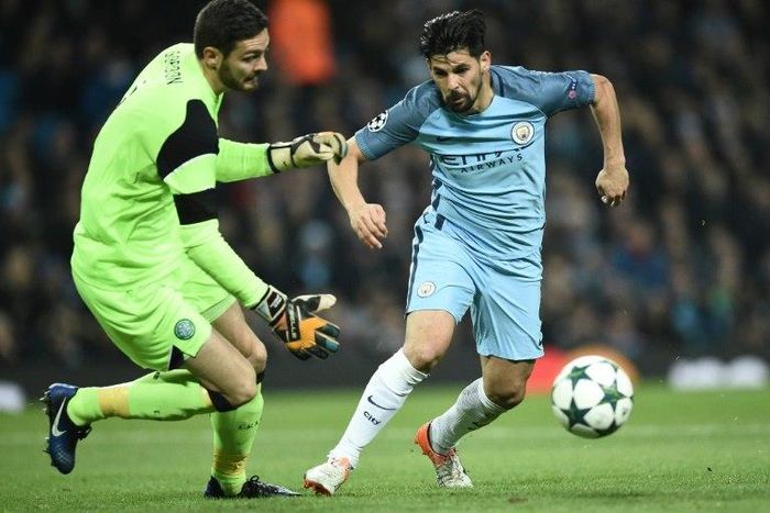 Manchester City's Spanish midfielder Nolito (R) vies with Celtic's Scottish goalkeeper Craig Gordon during the UEFA Champions League group C football match between Manchester City and Celtic on December 6, 2016