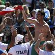 Italy's tennis player Fabio Fognini waves his jersey celebrating with teammates after defeating Argentina's Guido Pella on February 6, 2017