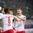 Players of RB Leipzig celebrate after scoring a goal during their German first division Bundesliga match against Schalke 04, in Leipzig, on December 3, 2016
