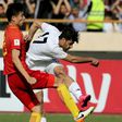 Iran's Mehdi Taremi (right) in action against China during a 2018 World Cup qualifier in Tehran on March 28, 2017