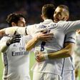 Real Madrid's forward Cristiano Ronaldo (C) is congratulated by teammate Karim Benzema (R) after scoring on February 11, 2017