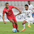 UAE's Al-Jazira player Salim Rashid (R) fights for the ball with Qatar's Lekhwiya player Youssef Al-Arabi during the Asian Champions League football match between Lekhwiya SC and Al-Jazira Club on February 20, 2017