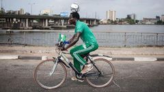 Harrison Chinedu rides 64 miles with a ball balanced on his head